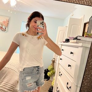 NEW WITH TAGS! white tee with floral stitching around the neck